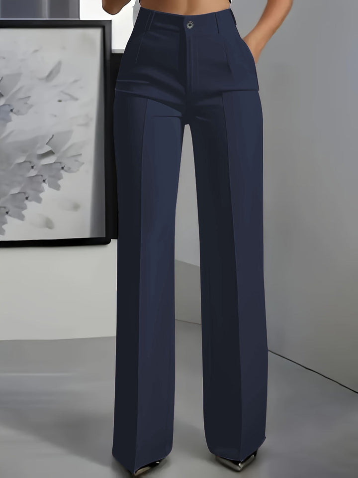 High-waisted straight-leg trousers in deep blue, button closure, straight legs.