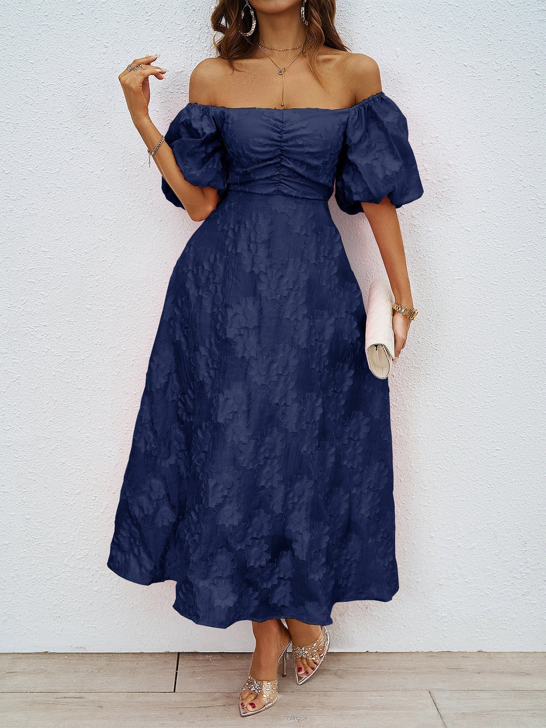 Navy off-shoulder midi dress with puff sleeves and textured fabric