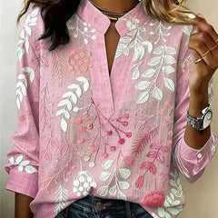 Blush pink embroidered popover blouse with V-neck and 3/4 sleeves, floral vine design