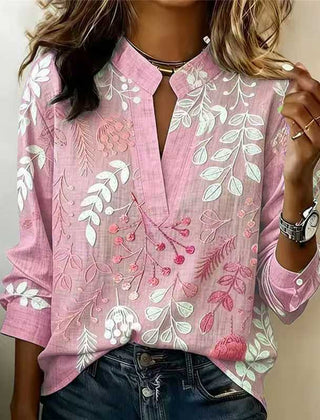 Blush pink embroidered popover blouse with V-neck and 3/4 sleeves, floral vine design