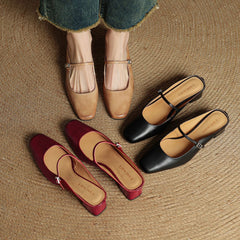 Assorted genuine leather mules in apricot, red, and black with slingback straps