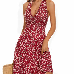 Red floral halter line dress with fitted bodice and tiered skirt