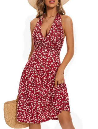 Red floral halter line dress with fitted bodice and tiered skirt