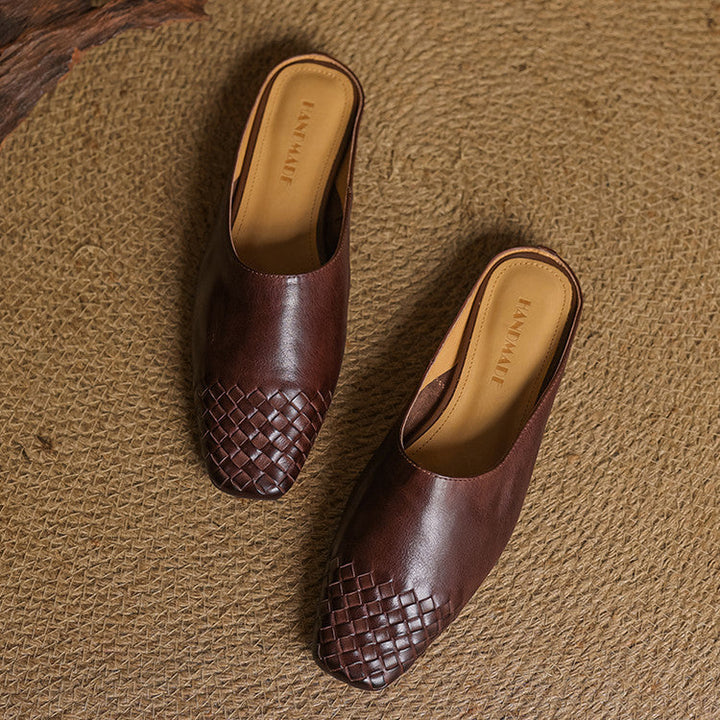 Dark brown woven leather mule slides with low heel, open back
