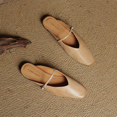 Miral genuine leather mules in apricot, pointed slip-ons with thin sling strap
