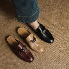 Genuine leather mules in maroon, tan, and black with metallic buckle straps