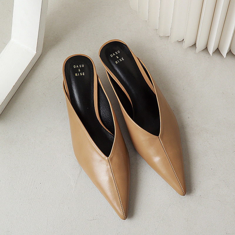 Brown pointed-toe slip-on mules with low heel and smooth finish