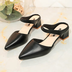 Black pointed-toe block heel mules with slingback strap, pair view