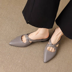 Gray pointed-toe slingback mules with cross straps and low block heel