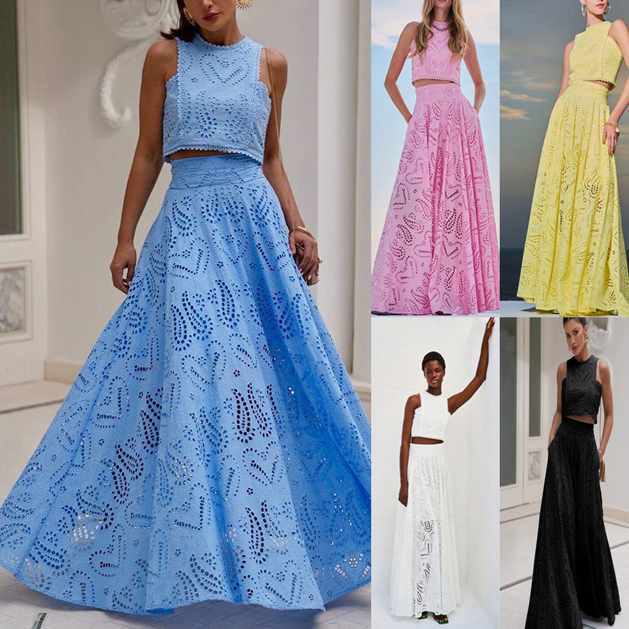 Women’s eyelet maxi dress set in blue, sleeveless fitted bodice with full skirt.