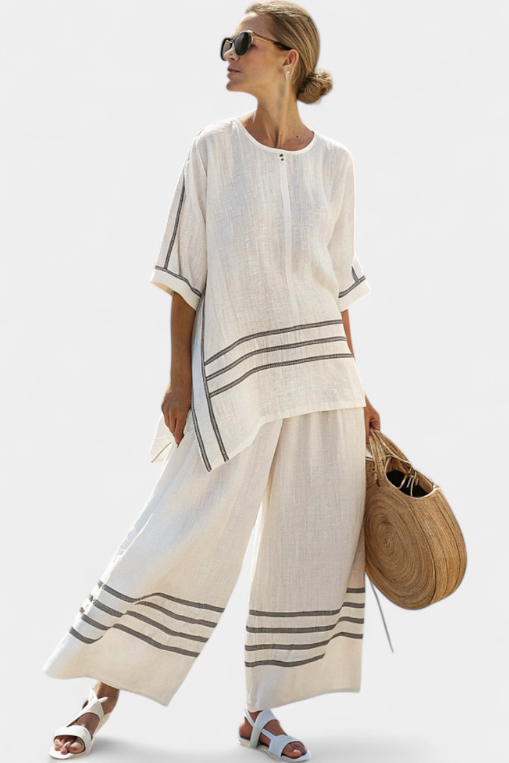 Off-white striped asymmetrical top and wide-leg pants set with dark horizontal bands