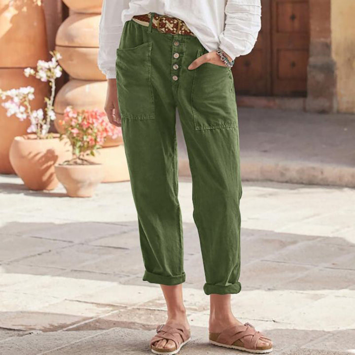 Olive green casual pants with button front, patch pockets, and cuffed ankle hem