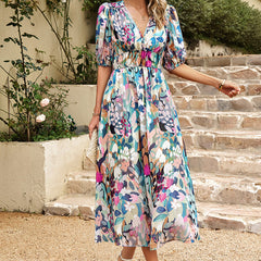 Multicolor floral midi dress with V-neck, puff sleeves, and cinched waist