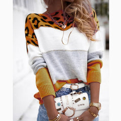Leopard-print color block knit sweater with white chest and orange-brown sleeves