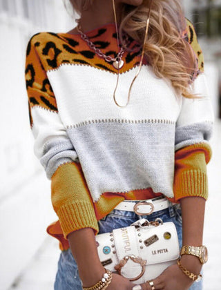 Leopard-print color block knit sweater with white chest and orange-brown sleeves