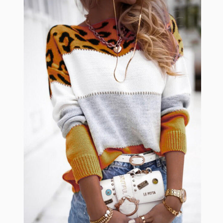 Leopard-print color block knit sweater with white chest and orange-brown sleeves