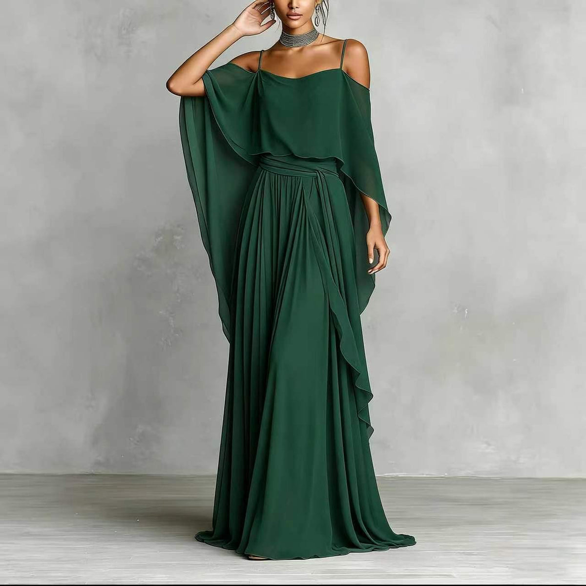 Dark green draped cold-shoulder maxi dress with draped overlay and pleated skirt