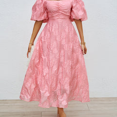 Pink off-shoulder midi dress with puff sleeves and ruched neckline