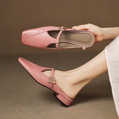 Pink leather mules with open back, sling strap and gold buckle, low block heel