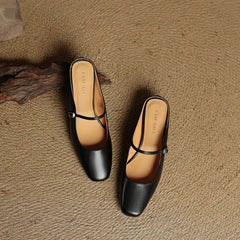 Esmer genuine leather mules in black with T-strap buckles and square toe