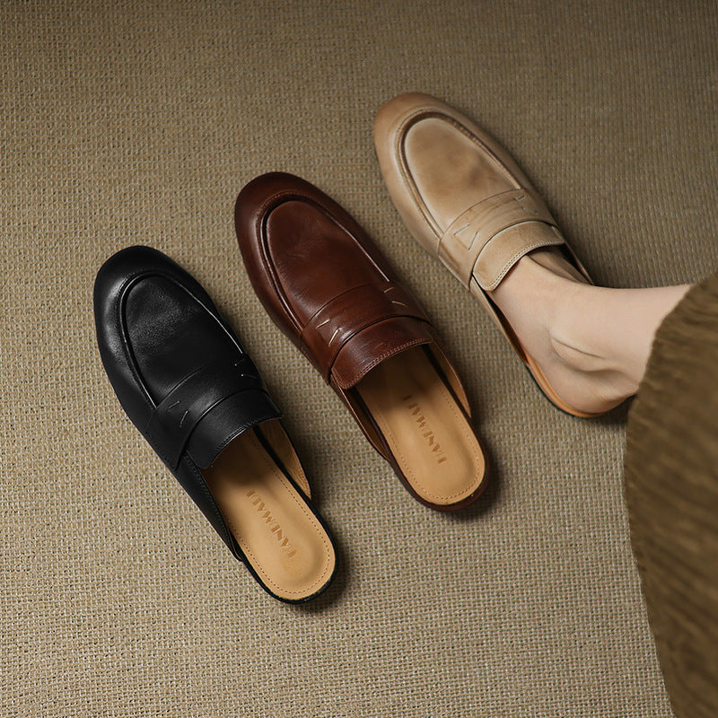 Set of leather mules: black and brown pairs shown side by side