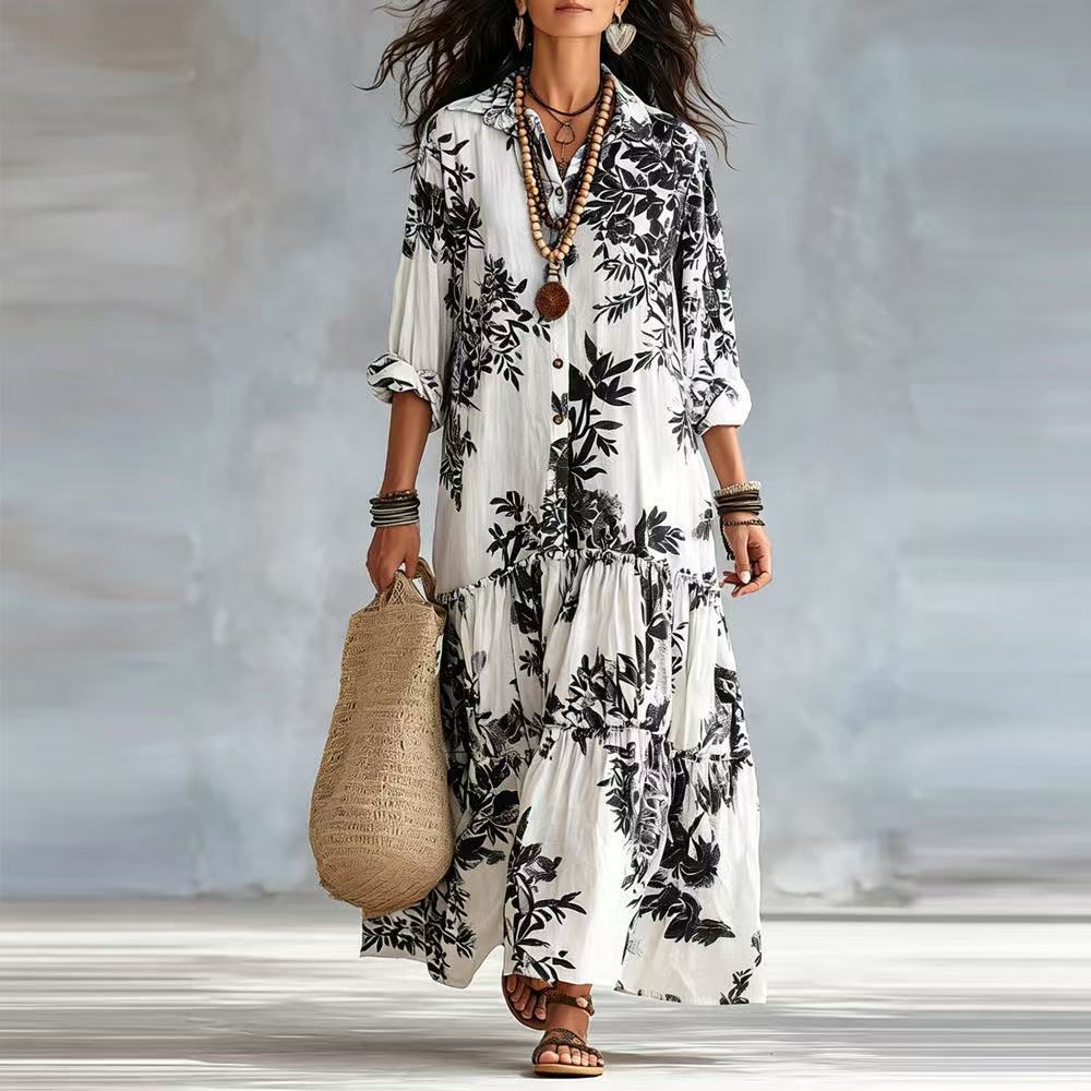 Tiered button-down maxi dress with black floral print and three-quarter sleeves