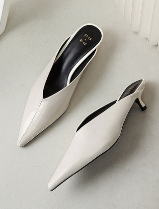 White pointed-toe slip-on mules with low block heel