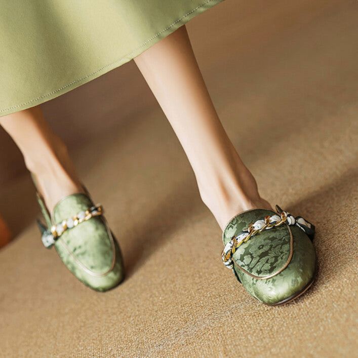 Green genuine leather mules with floral print, braided bow detail, flat slip-on