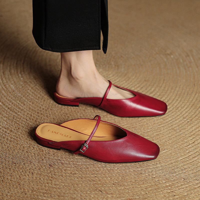 Maroon leather mules with slingback strap and square toe, buckle detail on top