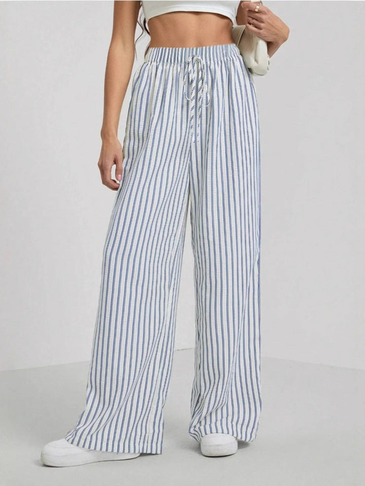 Light blue striped trousers with drawstring waist and wide legs