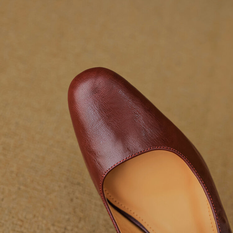 Maroon leather mule with open sling and tan insole, close-up upper