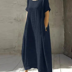 Navy blue casual maxi dress with short sleeves and round neckline, loose fit