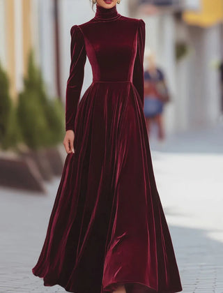 Red velvet dress with high neck, long sleeves, fitted bodice, flared skirt