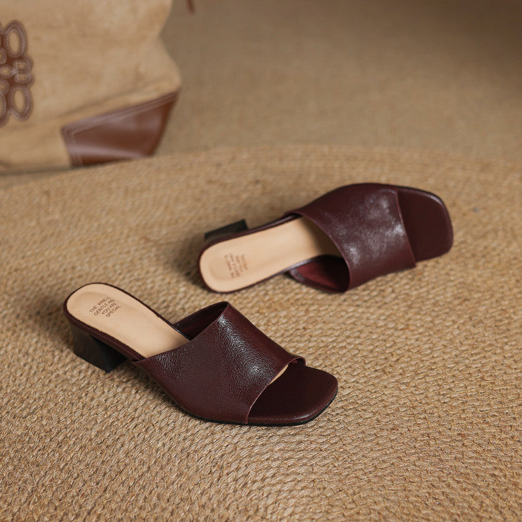 Maroon genuine leather mule sandals, open toe, block heel, pair view on floor
