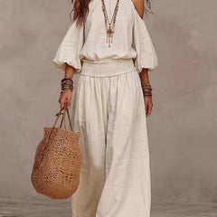 Liliana™ jumpsuit in beige, cold-shoulder with puff sleeves and wide-leg pants