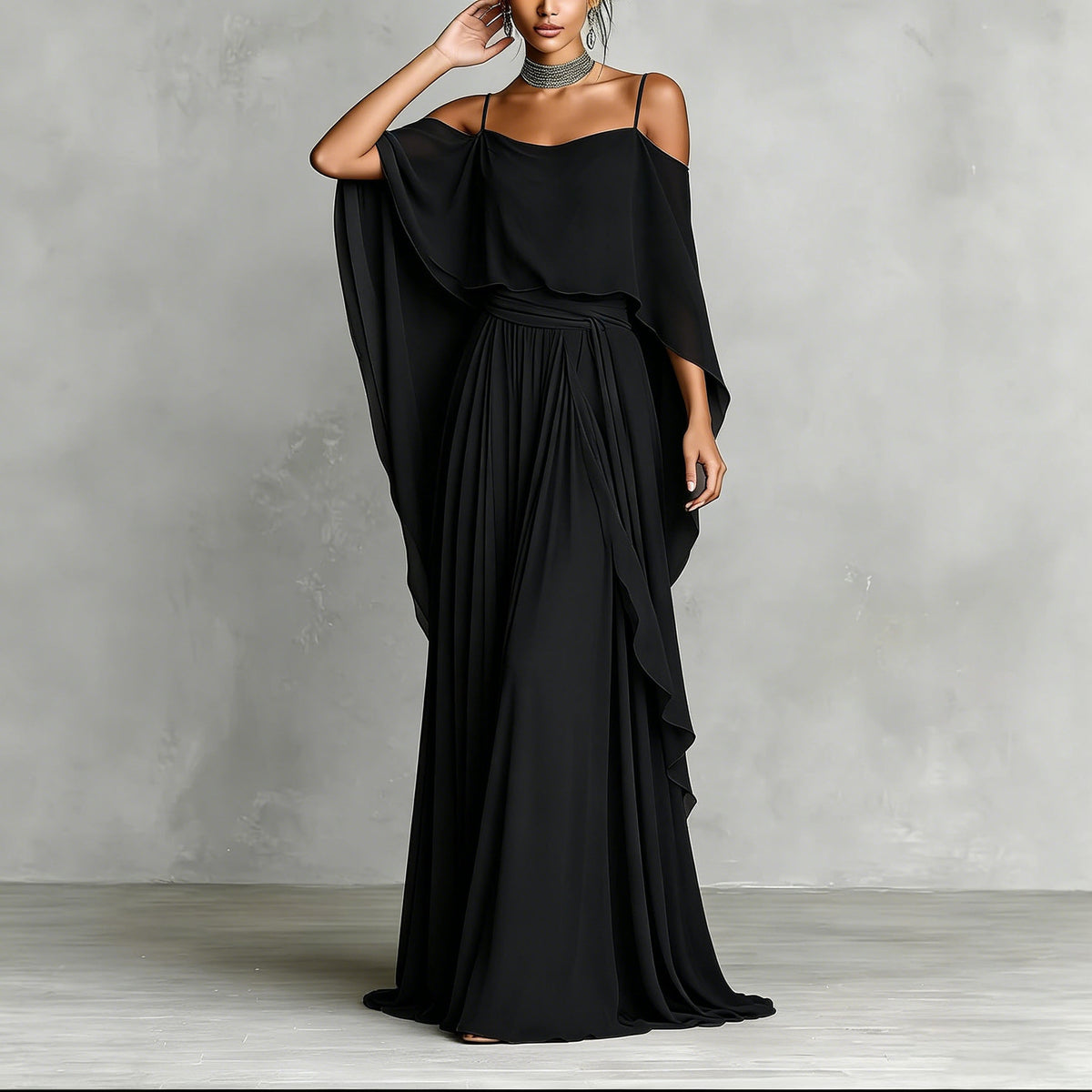 Black draped cold-shoulder maxi dress with flutter sleeves and pleated skirt