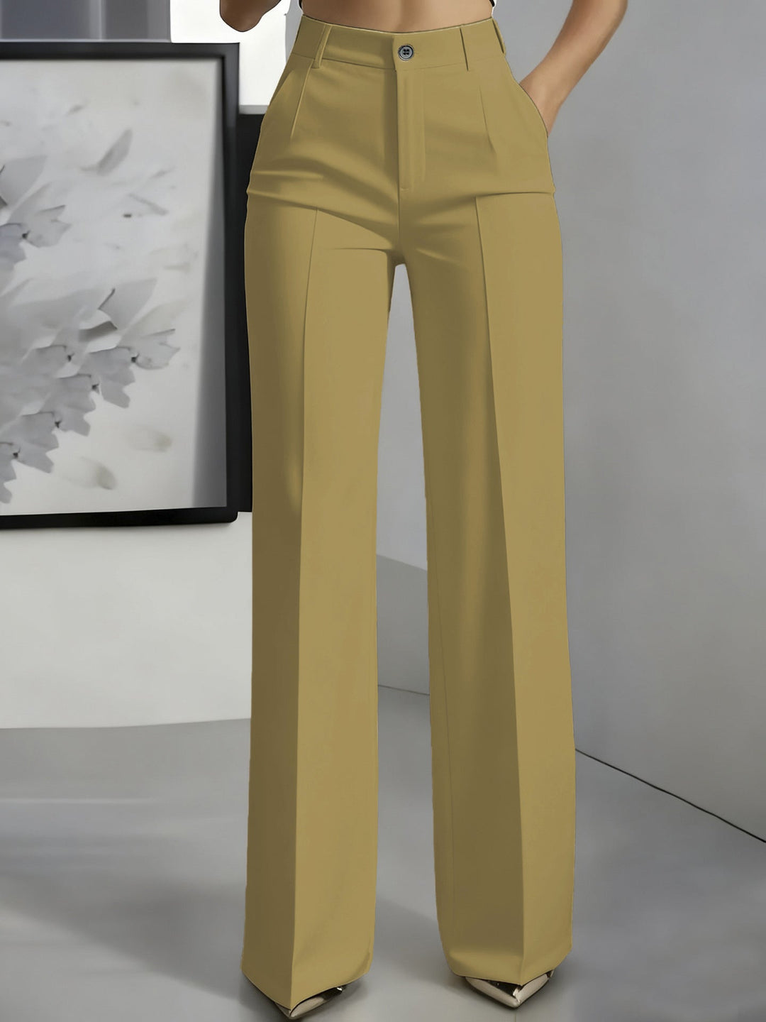 Golden high-waisted straight-leg trousers with front button and pressed creases