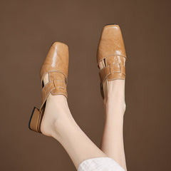 Apricot leather mules with squared toe and side strap buckle detail