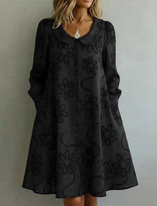 Black embroidered midi dress with V-neck, long puff sleeves, A-line skirt