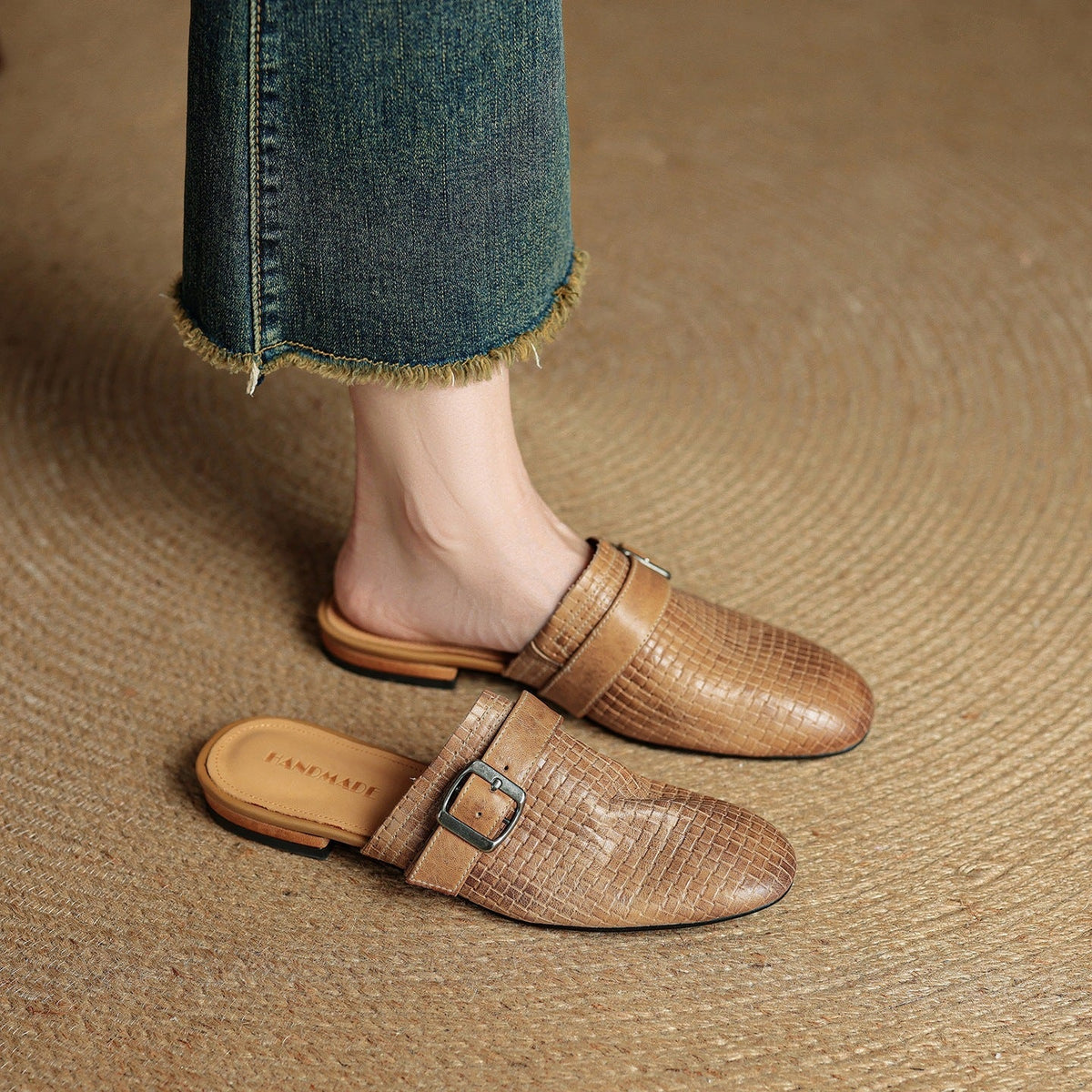 Brown woven-leather mule with buckle strap and low heel