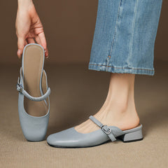 Light blue leather Mary Jane mules with elastic Mary Jane strap and block heel