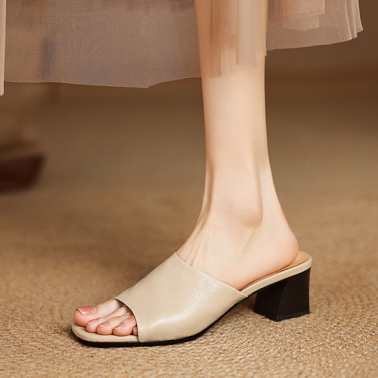 Beige genuine leather mule sandals with open toe and low block heel