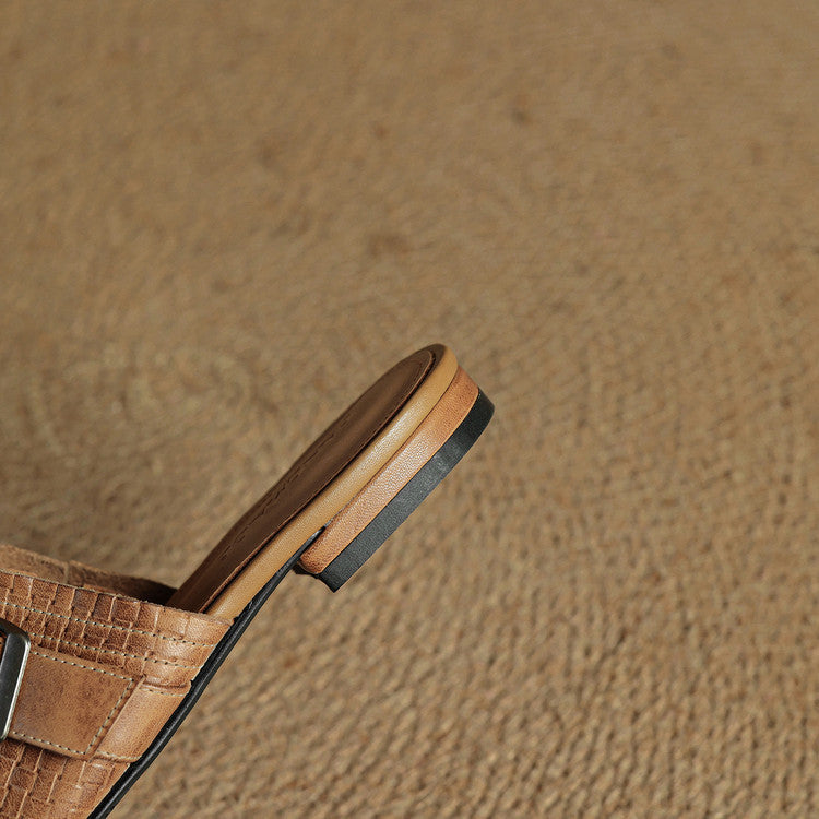 Brown leather mule side view with square toe and buckle strap