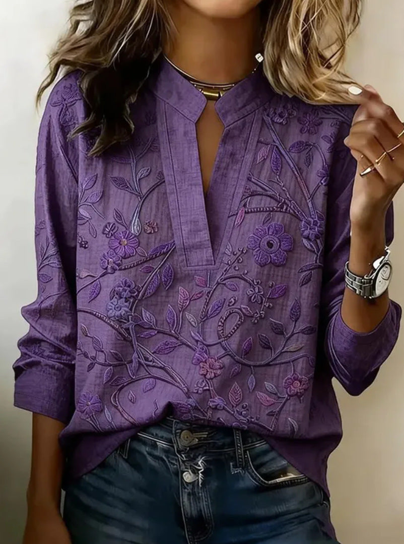Purple embroidered popover blouse with V-neck and 3/4 sleeves, vine and leaf pattern