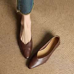 Dark brown genuine leather mules with almond toe and low slip-on heel