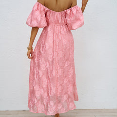 Pink off-shoulder midi dress, back view, with puff sleeves and full gathered skirt