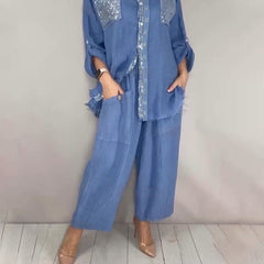 Blue button-up shirt set with silver sequin pocket panels and wide-leg matching pants