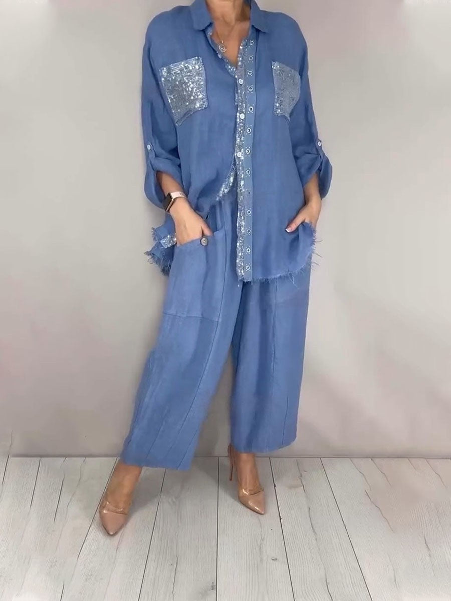 Blue button-up shirt set with silver sequin pocket panels and wide-leg matching pants