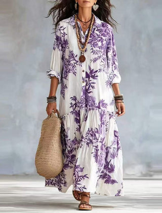 Tiered button-down maxi dress with purple floral print and three-quarter sleeves