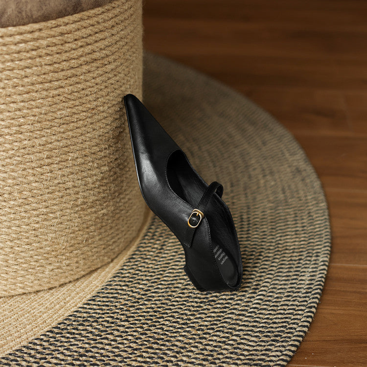 Black genuine leather mule with open back and T-strap buckle, pointed toe.
